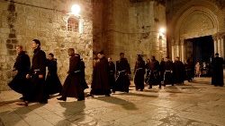 Franciscan friars leave the Church of the Holy Sepulchre in Jerusalem (file photo)