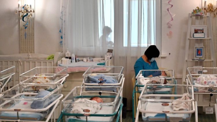 File photo of babies born to surrogate mothers in Ukraine who were stranded when foreign parents could not collect them