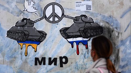 Graffito: Panzer mit Friedenssymbol