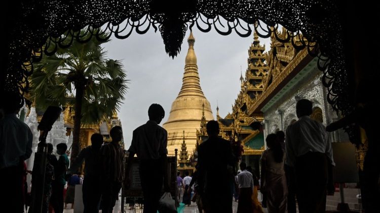 FILE PHOTO: Buddhist devotees visit  Shwedagon Pagoda during the Warso Full Moon Festival in Yangon in 2022