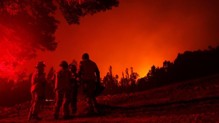 FIrefighters during a fire in Puren, in Chile's Araucania region. 