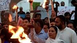 Christians hold a torchlight rally in Karachi on 19 August to condemn attacks on churches in Pakistan