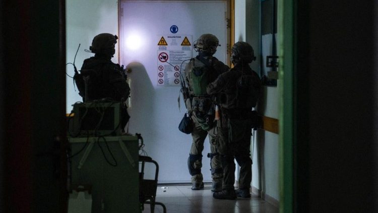 A handout picture released by the Israeli army reportedly shows Israeli soldiers inside Al-Shifa hospital in Gaza City