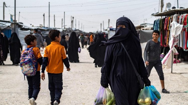 Women and children in a camp in northeastern Syria