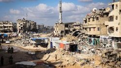 Tents are set up by displaced Palestinians amid the devastation in Khan Yunis in the Gaza Strip