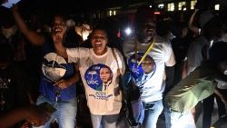 UDC supporters celebrate the victory
