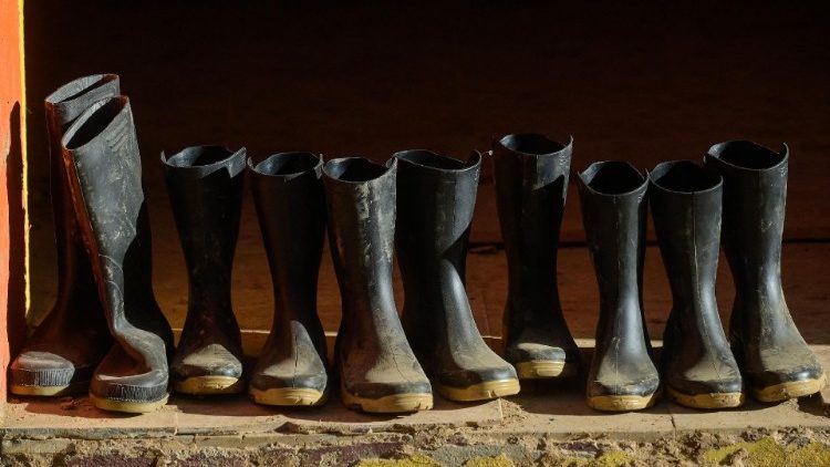 Rubber boots outside a house destroyed by the deadly floods in Paiporta, near Valencia, Spain.