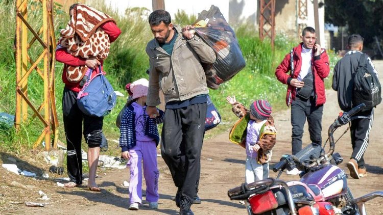 Families of Syria's Alawite community flee sectarian violence