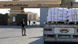 Israel said it would open the Rafah crossing from Gaza to Egypt to allow residents to exit the Palestinian territory "in the coming days"