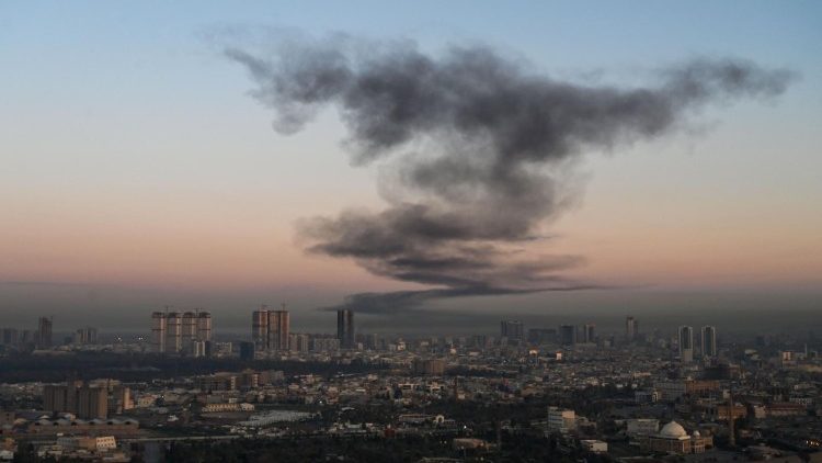 Smoke rises near Erbil International Airport on March 1