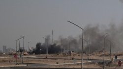 Smoke rises following a strike on Kuwait 
