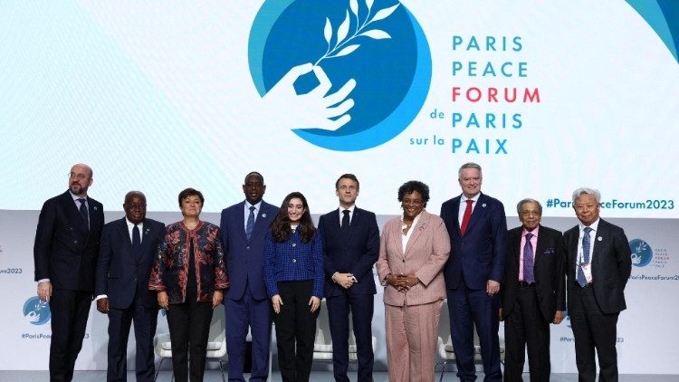 Group photo of participants in the Paris Peace Forum