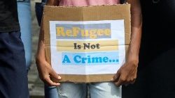 Rohingya refugees protest in front of the UNHCR office in Colombo