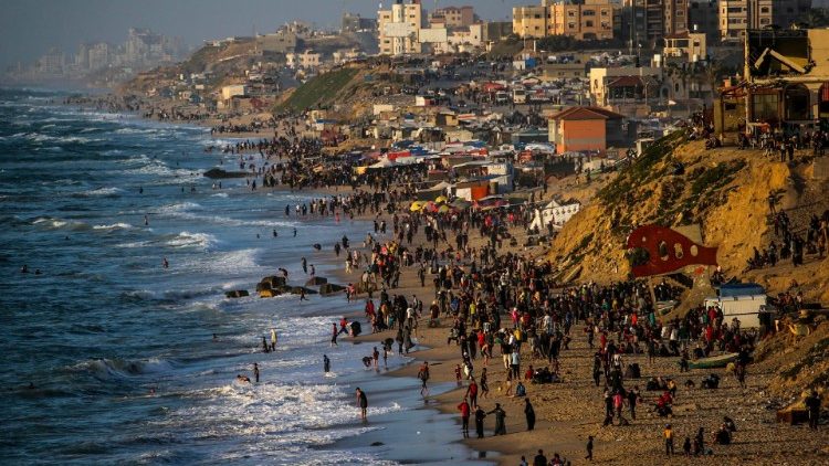 Internally displaced Palestinians at a beach in southern Gaza