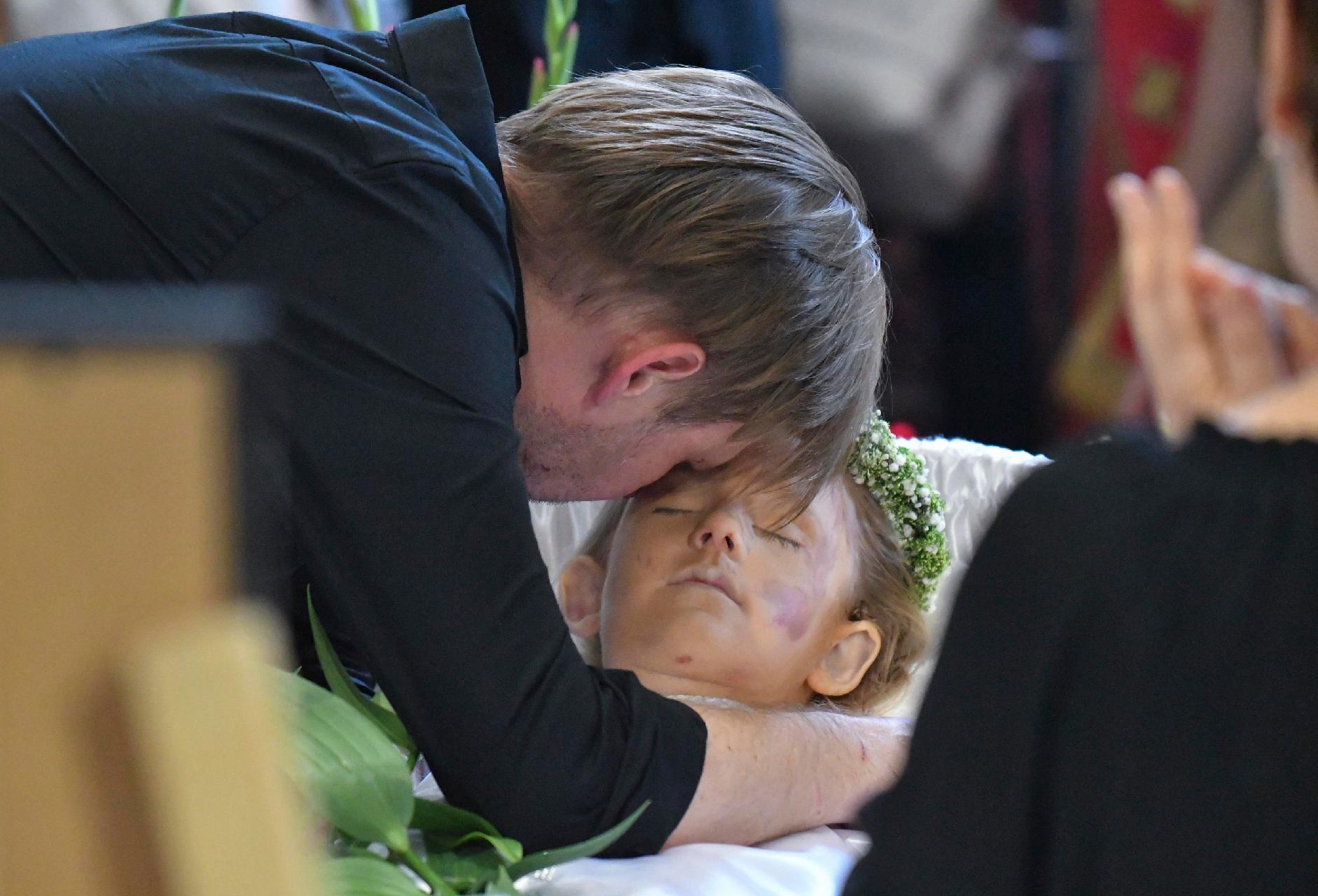 Ukraine bids farewell to mother and daughters killed in Russian strike on Lviv