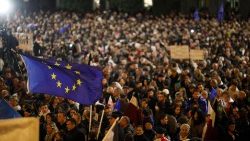 Pro-opposition supporters rally near the Georgian parliament on October 28.