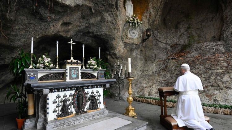 Pope Leo XIV prays for the sick at the Lourdes grotto in the Vatican Gardens 