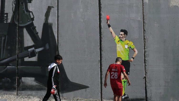 Mural protesting the demolition of a playground in the West Bank