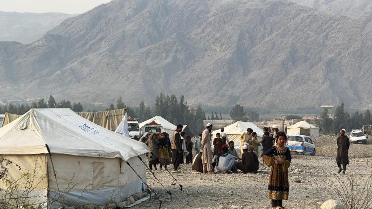 People displaced from the border region after conflicts with Pakistan live in temporary shelters near the Torkham border in Nangarhar province, Afghanistan