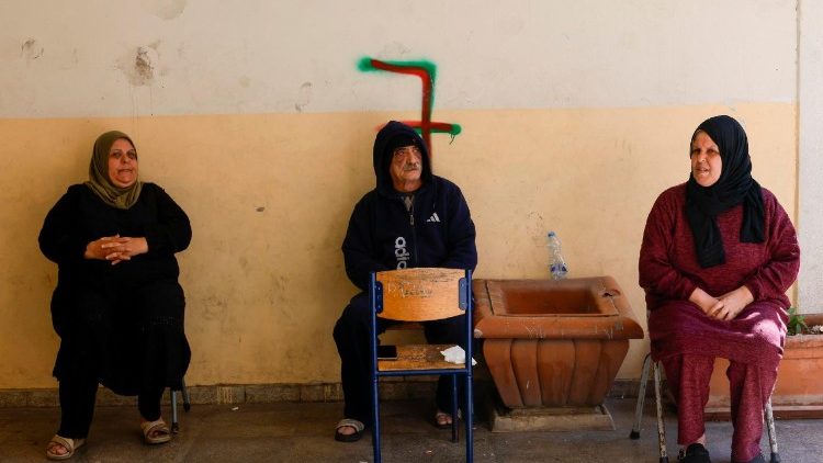 Displaced residents take shelter in a school in Beirut