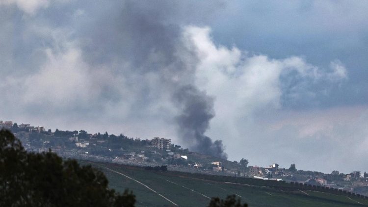 Smoke rises from the Lebanese border town of Al Khayam following an Israeli strike as seen from Kibbutz Dan, in the Upper Galilee, northern Israel