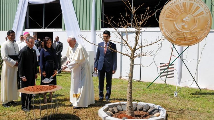 Pope Francis and Madagascar's President Andry Rejoelina attending a symbolic planting of a baobab tree on September 7, 2019.
