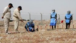 Women participate in efforts to clear landmines in Iraq