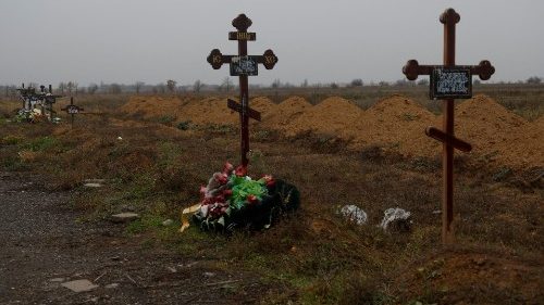 Graves of Ukrainian service member killed during the first day of  Russian full scale invasion of Ukraine
