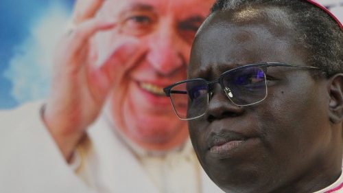 The Archbishop of Juba, Stephen Ameyu with a portrait of Pope Francis in the background.