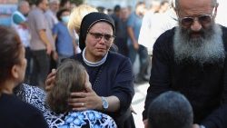 Worshippers attend a funeral at Greek Orthodox Saint Porphyrius Church, in Gaza City