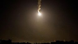 A flare falls over Gaza amid the ongoing conflict between Israel and the Palestinian group Hamas