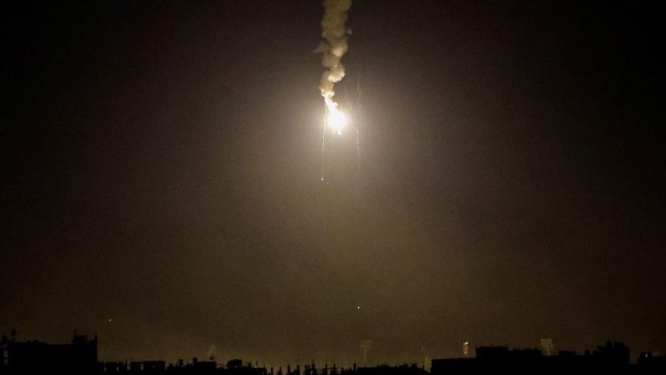 A flare falls over Gaza amid the ongoing conflict between Israel and the Palestinian group Hamas