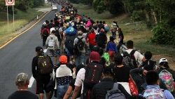 Migrants continue walking in a caravan to reach the U.S. border through Mexico, in Escuintla