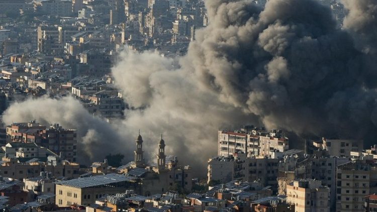 Smoke billows over Beirut's southern suburbs, after an Israeli strike