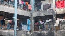 Displaced Palestinians take shelter in a school in Khan Younis ahead of a ceasefire between Israel and Hamas, set to take effect on Sunday