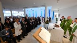 People attend the Eucharistic Adoration and Holy Mass at Gemelli Hospital where Pope Francis is admitted for treatment, in Rome