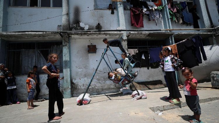 Palestinian children play during the Eid al-Adha holiday, in Gaza City