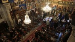 Dans la soirée du 17 juillet dans l'église de la Sainte-Famille, après l'attaque d'Israël. 