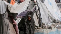 File photo of Palestinians displaced by an Israeli military offensive shelter in an UNRWA school, in Khan Younis
