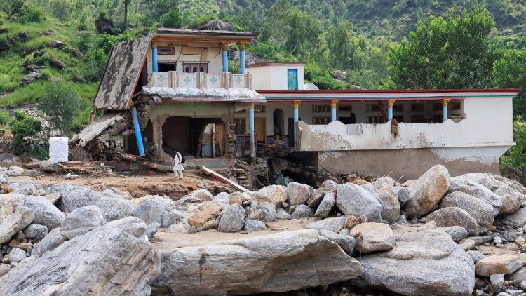 A view of the damaged family house of Noor Muhammad, 25, who lost 24 family members and relatives, which was hit by devastating floods in the mountainous Qadir Nagar village of Buner district, Khyber Pakhtunkhwa province