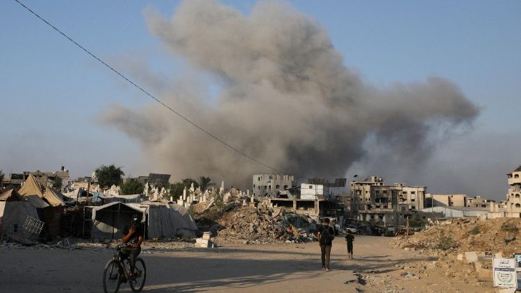 Smoke rises following an Israeli strike, in Gaza City