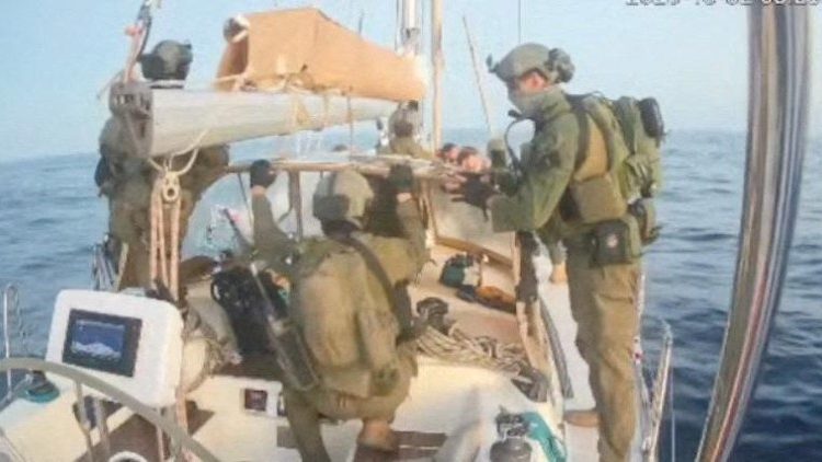 Gaza-bound vessel Oxygono, part of the Global Sumud Flotilla, as they are intercepted by people in uniform