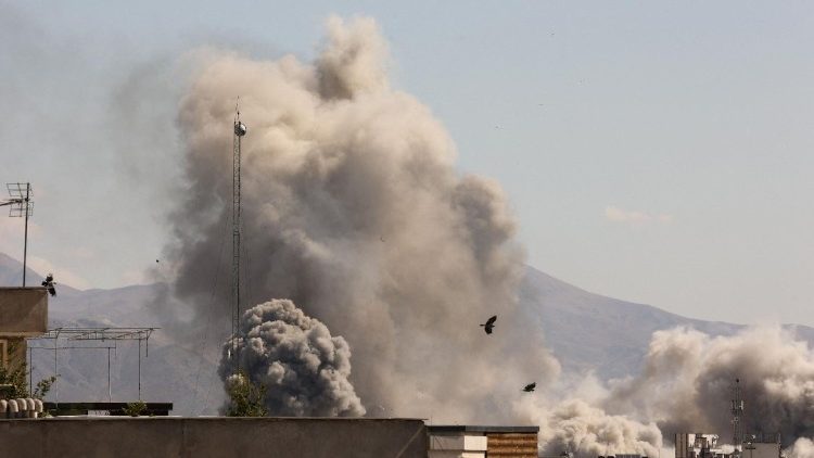 Smoke rises following an explosion, after Israel and the U.S. launched strikes on Iran, in Tehran