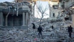  People inspect the site of an Israel and U.S. strike on a police station in Tehran, Iran