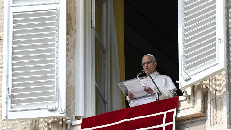 Pope Leo XIV leads the Angelus prayer from the window of the Apostolic Palace at the Vatican