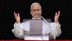 Pope Leo XIV leads the Angelus prayer from a window of the Apostolic Palace, at the Vatican