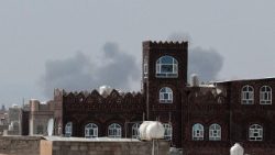 Smoke rises after an airstrike hit the Sanaa International Airport