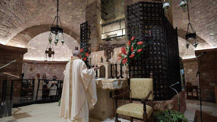 Pope Francis celebrates Mass at the tomb of St Francis in Assisi in 2020