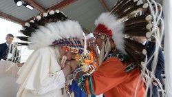 Pope Francis kisses Chief Wilton Littlechild in Maskwacis, Canada
