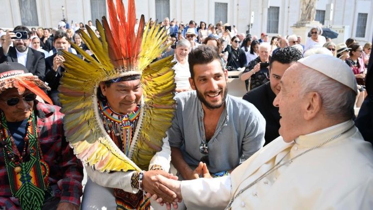 Pope Francis meets with an indigenous leader at the General Audience on June 28, 2023